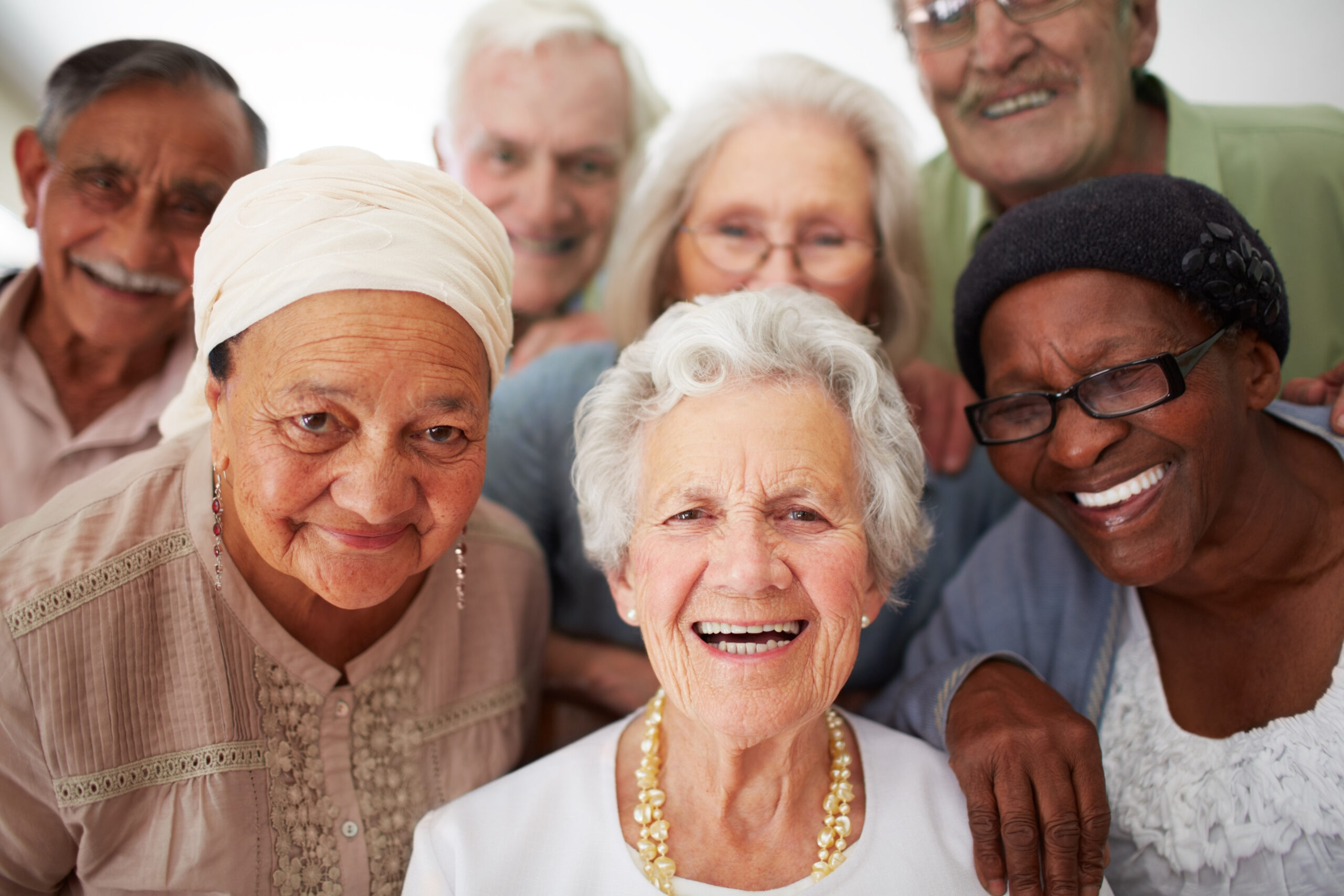 Diverse group of older adults smiling